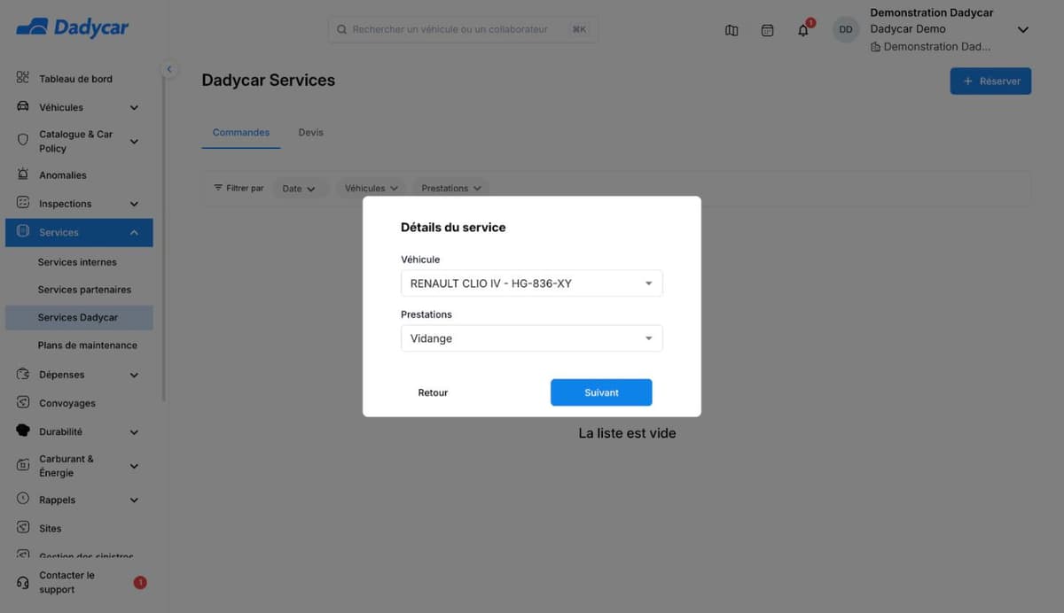 La fenêtre Détails du service : le véhicule et la prestation Vidange choisis, avec les boutons Retour et Suivant